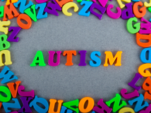 Colorful letters spelling Autism for Autism Awareness Month at Serendib Healthways.